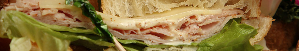 Eating Deli Sandwich at Martin's Deli restaurant in Avon, OH.